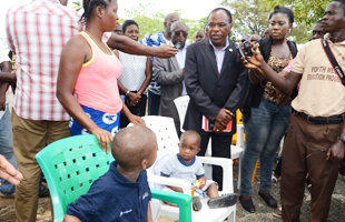 Francis Kateh, Deputy Minister of Health, Liberia, and Chief Medical Officer, at a ceremony to celebrate the recovery and discharge of 2 boys